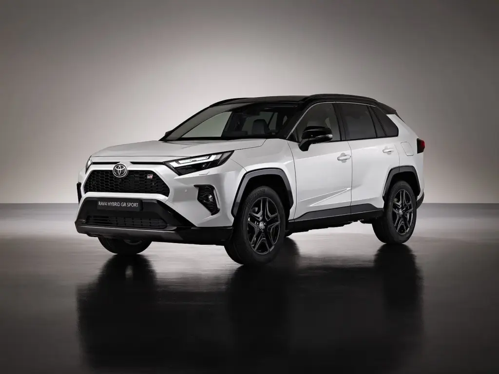 Explore the New Toyota RAV4 2025: Built Smarter, Safer, and More Connected Than Ever! Toyota RAV4 2025 parked in urban setting showing front grille, LED headlights, and aerodynamic design