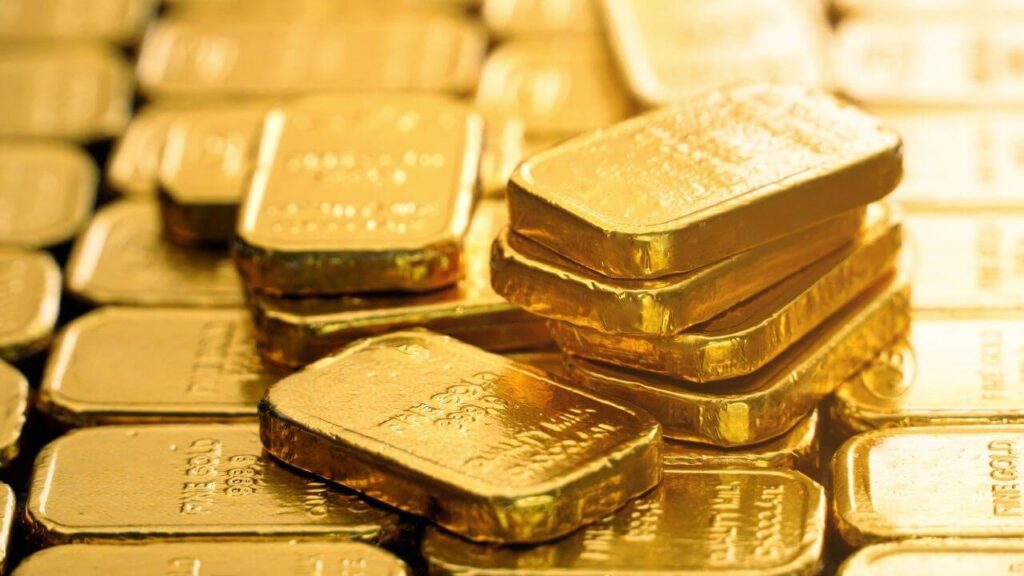 Today’s Gold Price in India: Should You Buy or Wait? Gold Rate Today in India - Gold bars and coins