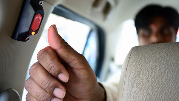 Bengaluru’s Panic Buttons: High-Cost System Fails to Deliver Commuter Safety Promise Interior of a Bengaluru public bus showing a red panic button near the passenger seat area.